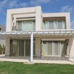 Villa 300 m² (5-bedroom) for sale in Hacienda Bay, Sidi Abdel Rahman, Egypt